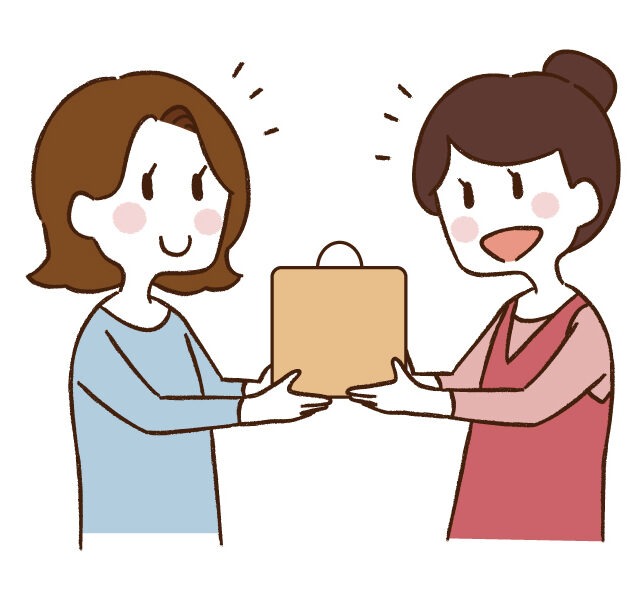 組合員さんがお友だちにサンプルをお渡し。